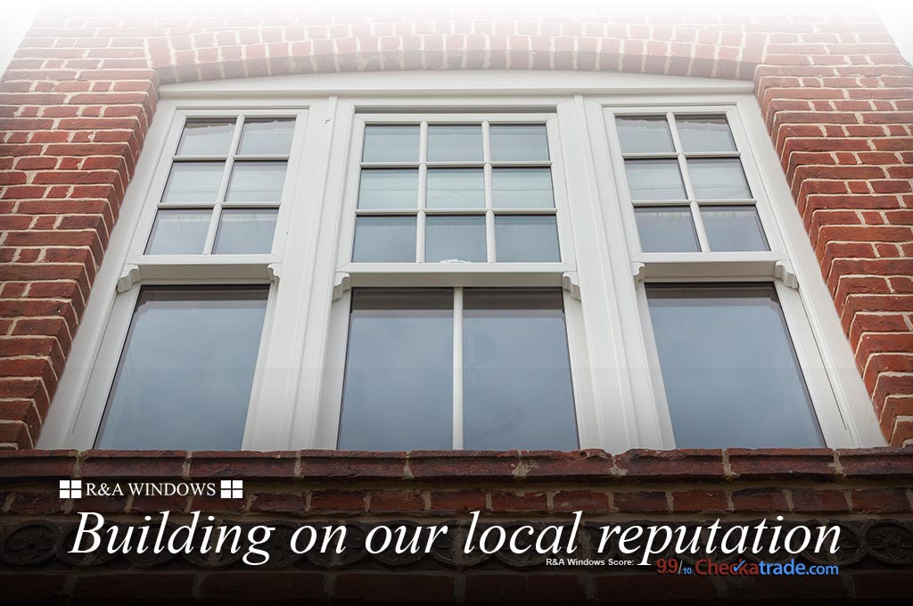 Traditipnal Vertical Sliding windows in family home with exterior window shutters